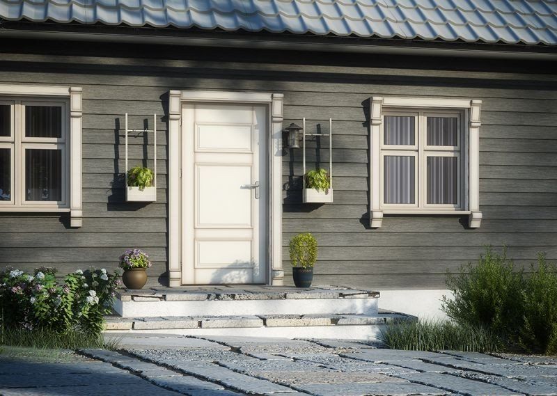 Stülpschalung mit Kerrafront Fassadenpaneelen in der Farbe grau